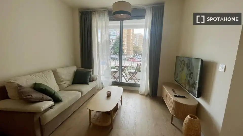 Sala d'estar de Apartament per a compartir en Málaga amb Aire condicionat, Terrassa i Moblat