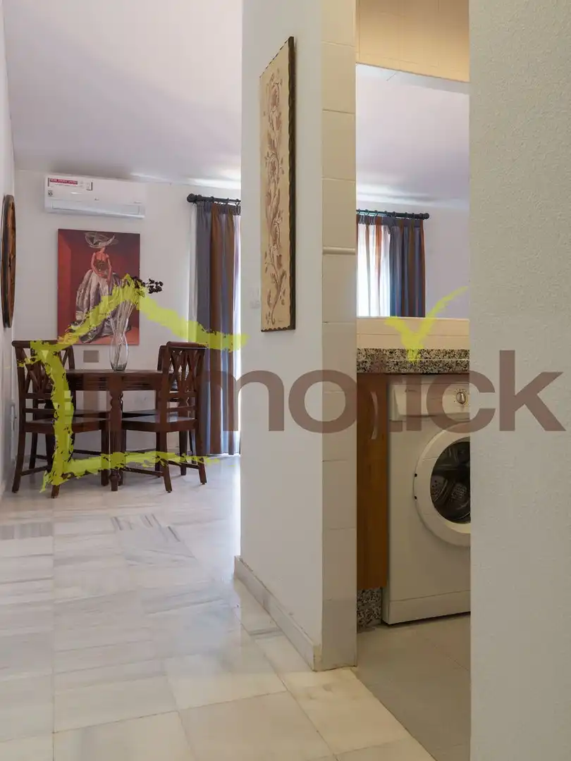 Sala d'estar de Àtic de lloguer en El Portil amb Aire condicionat, Terrassa i Moblat