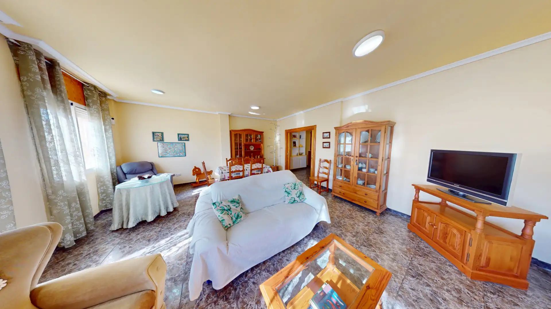 Sala de estar de Casa adosada en venta en Almería con Terraza, Amueblado y Horno