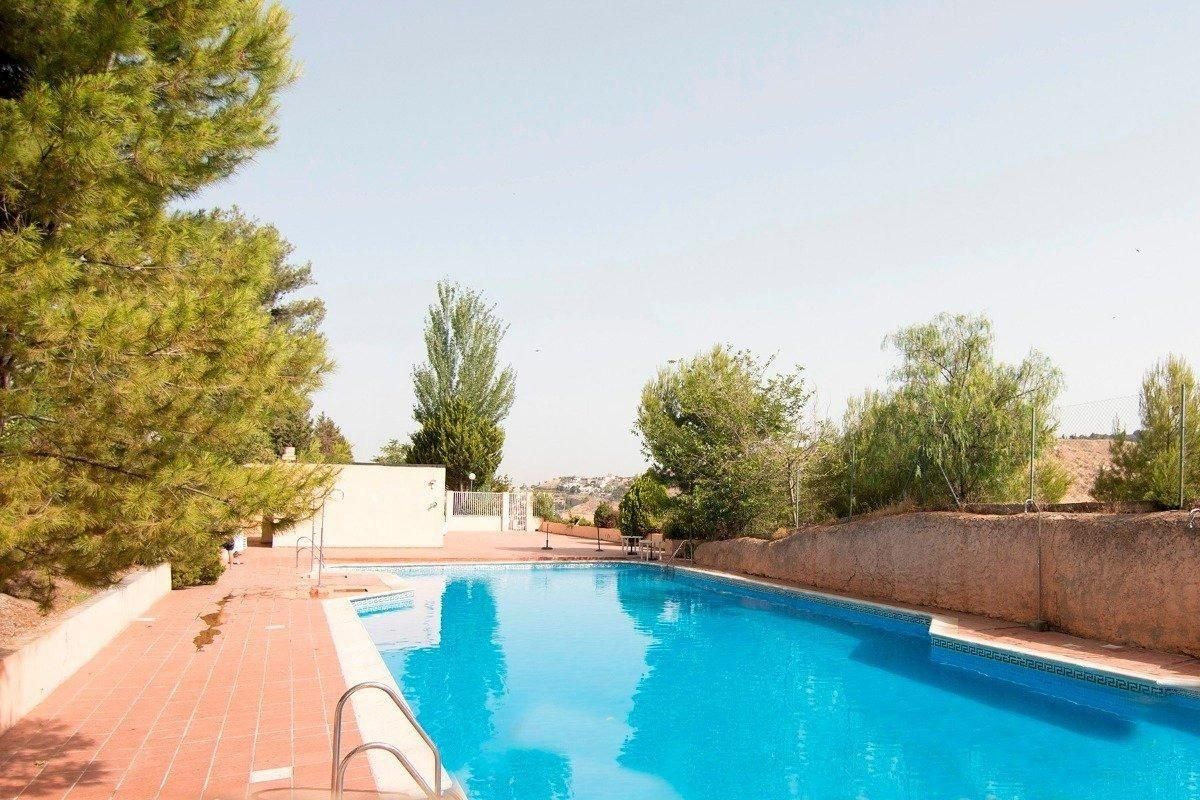 Swimming pool of Flat for sale in  Granada Capital  with Heating, Private garden and Parquet flooring
