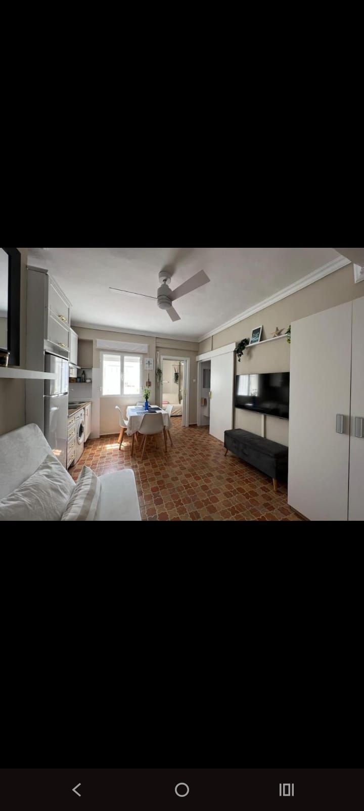 Sala d'estar de Apartament de lloguer en Chipiona amb Aire condicionat, Terrassa i Es permeten mascotes