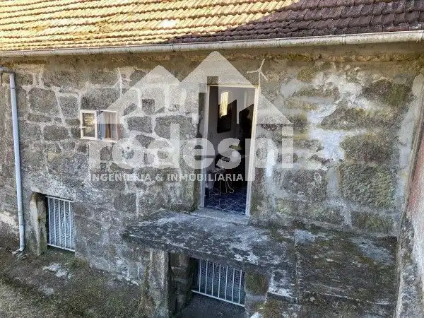 Vista exterior de Casa adosada en venda en Crecente amb Calefacció, Traster i Moblat