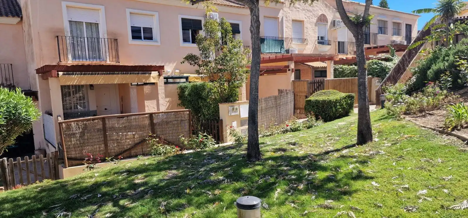 Jardí de Casa adosada en venda en Islantilla amb Piscina comunitària