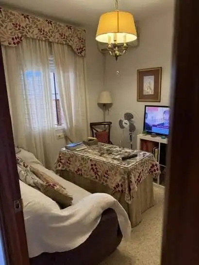 Sala d'estar de Casa adosada en venda en El Rocío - La Milagrosa
