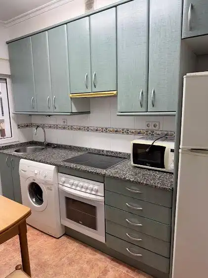 Kitchen of Flat for rent in Gijón   with Heating and Balcony