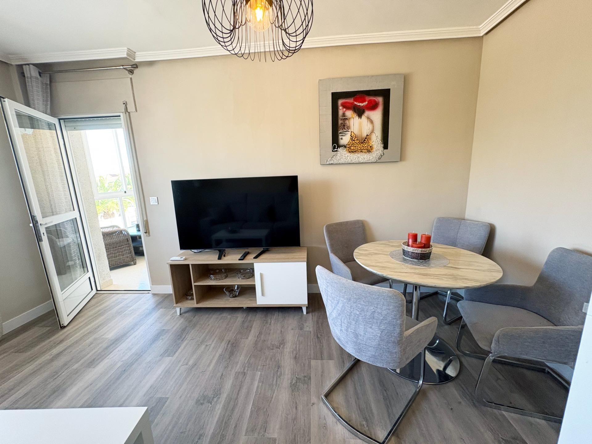 Sala d'estar de Casa adosada en venda en Pilar de la Horadada amb Aire condicionat, Calefacció i Jardí privat