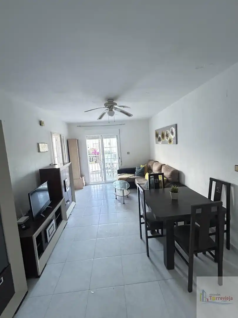 Sala de estar de Casa o chalet en venta en Torrevieja con Calefacción, Terraza y Piscina comunitaria