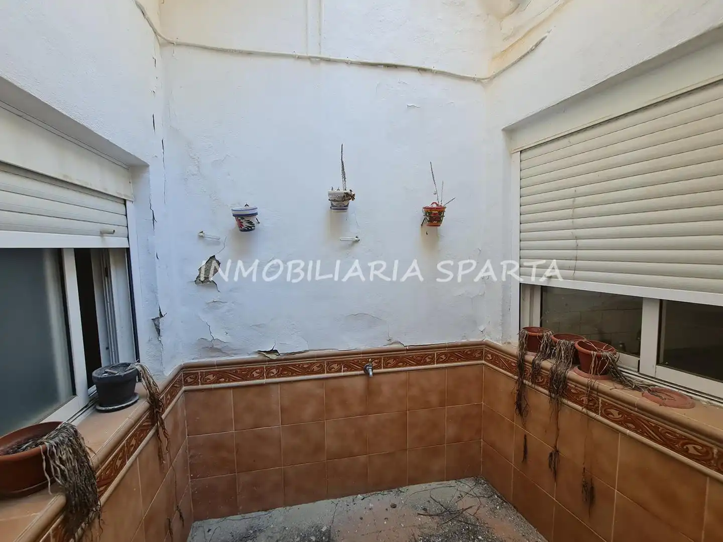 Casa adosada en venda en Sanlúcar la Mayor amb Jardí privat i Balcó