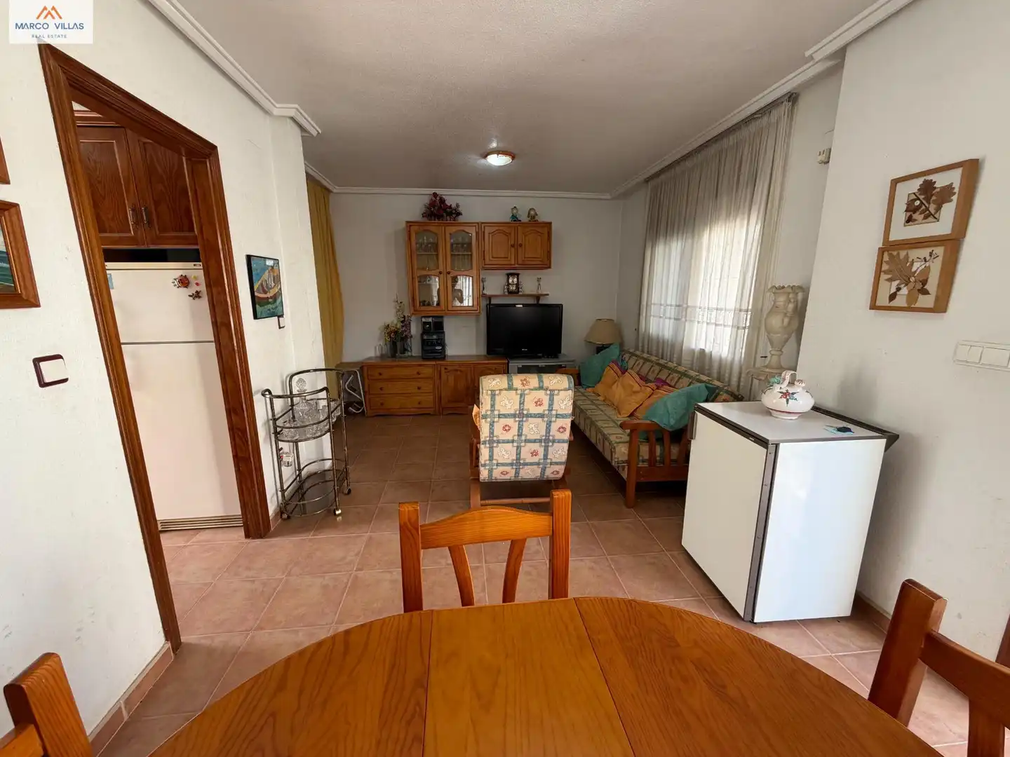 Sala de estar de Casa adosada en venta en Guardamar del Segura con Jardín privado, Terraza y Amueblado