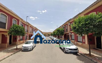 Vista exterior de Casa adosada en venda en Dos Hermanas amb Aire condicionat i Terrassa