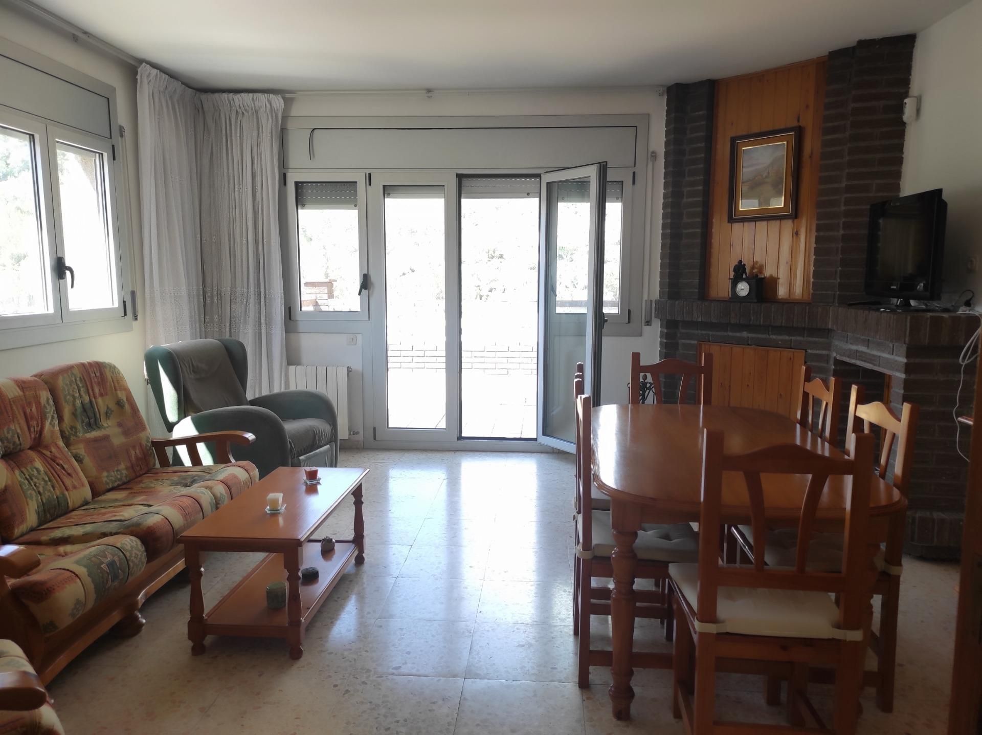 Sala d'estar de Casa o xalet en venda en Olivella amb Calefacció, Jardí privat i Terrassa