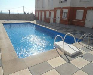 Swimming pool of Single-family semi-detached for sale in Alcanar  with Terrace, Storage room and Furnished