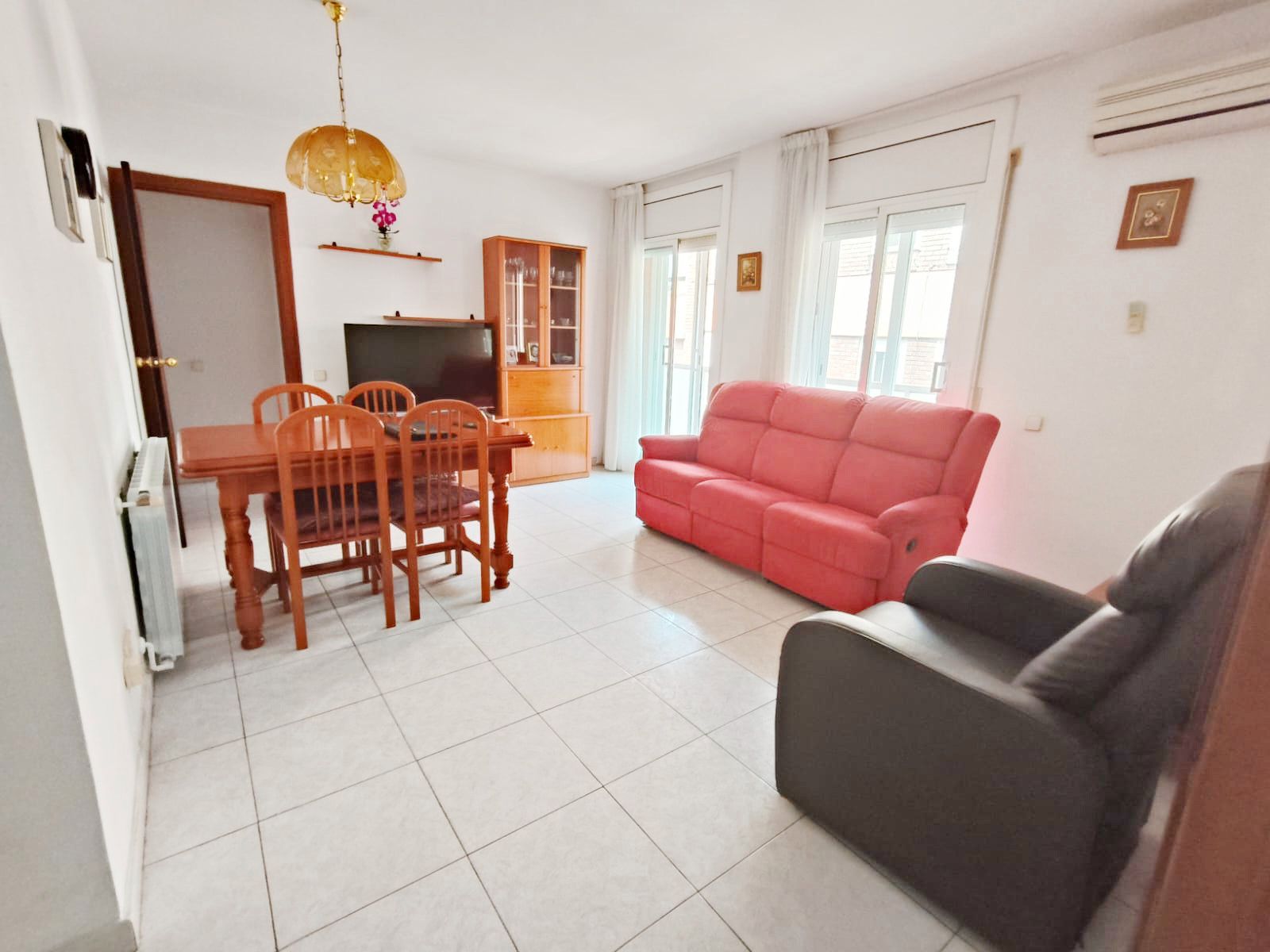 Living room of Flat for sale in Calella  with Air Conditioner, Heating and Oven