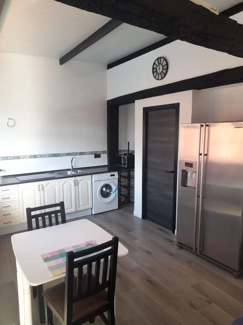 Cocina de Casa o chalet en venta en Brenes con Aire acondicionado, Jardín privado y Piscina