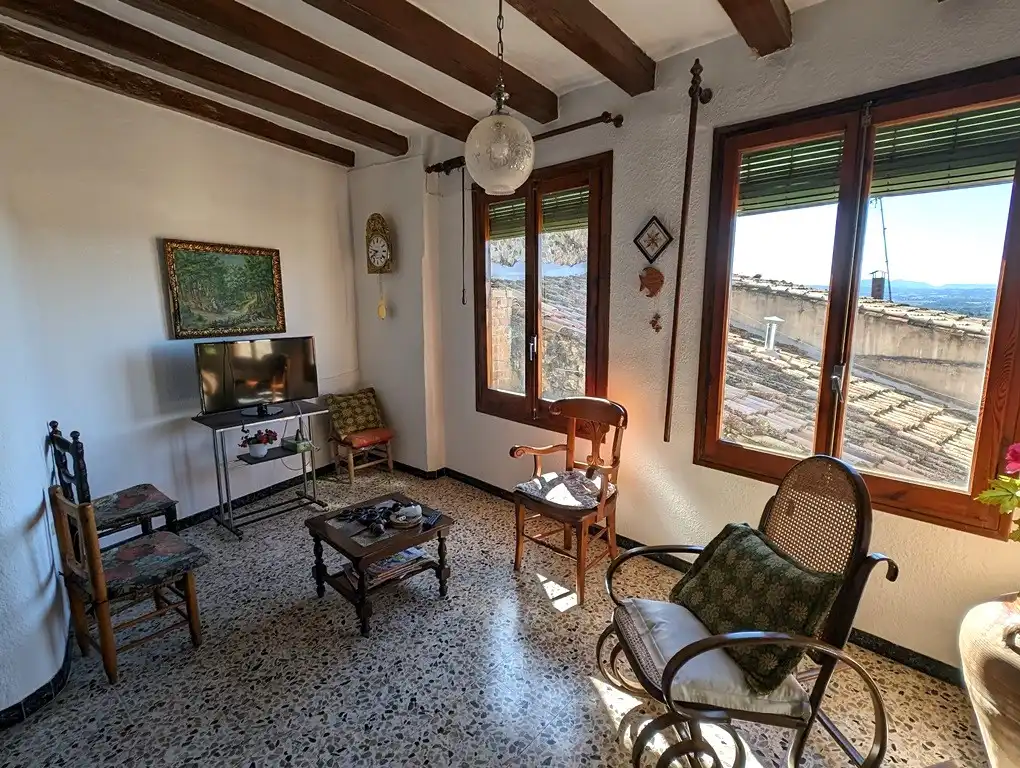 Sala d'estar de Casa o xalet en venda en Horta de Sant Joan amb Jardí privat, Terrassa i Moblat