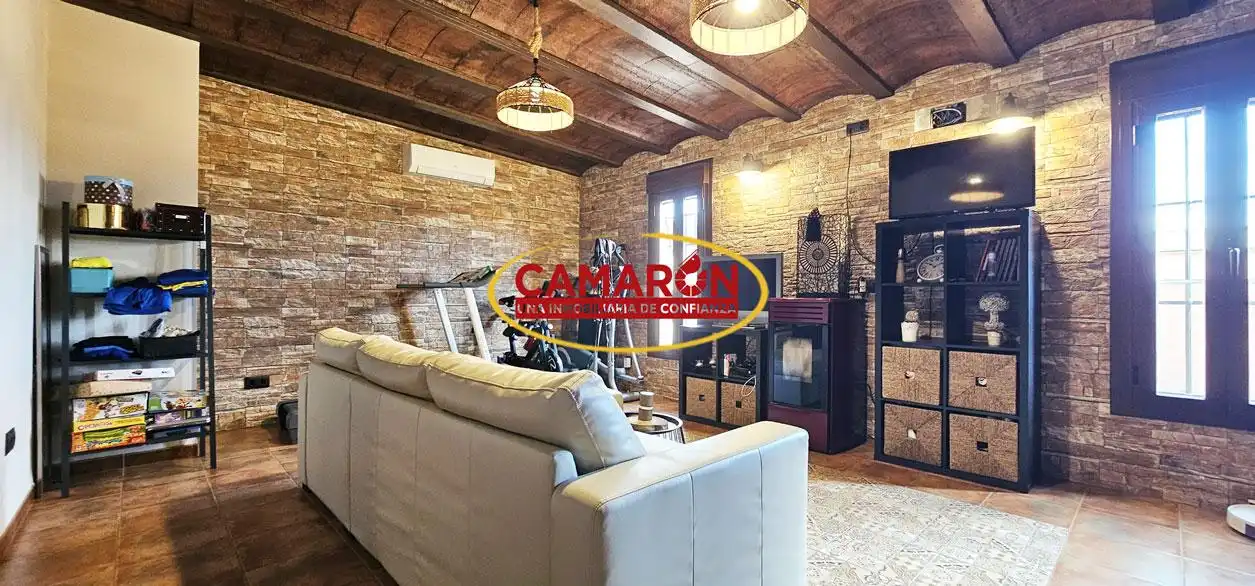 Sala d'estar de Casa o xalet en venda en Coria del Río amb Aire condicionat