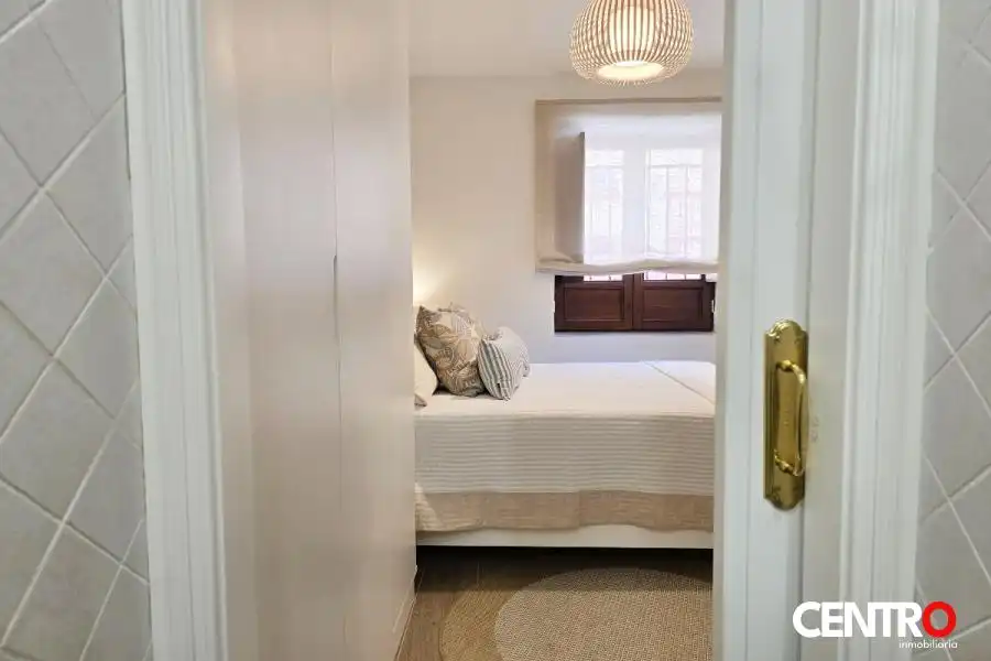 Dormitori de Apartament de lloguer en Granada amb Aire condicionat