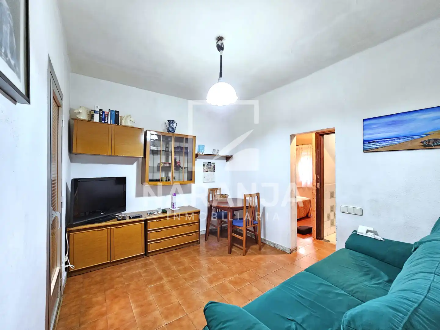 Sala d'estar de Casa adosada en venda en Barcelona amb Terrassa