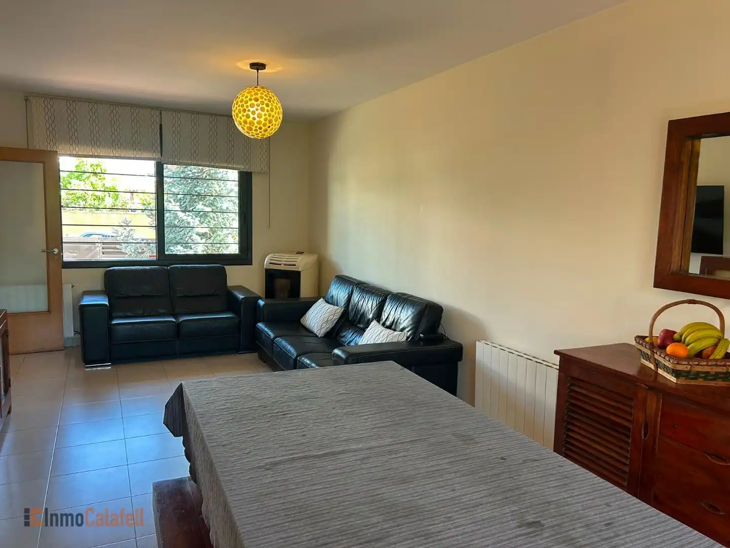 Sala de estar de Casa adosada en venta en Calafell con Aire acondicionado, Calefacción y Jardín privado