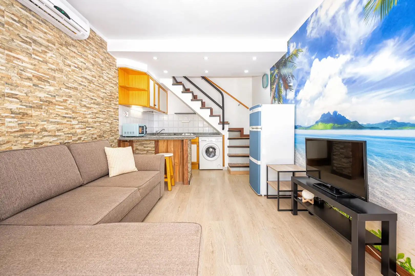 Sala de estar de Casa adosada en venta en San Bartolomé de Tirajana con Aire acondicionado, Jardín privado y Terraza