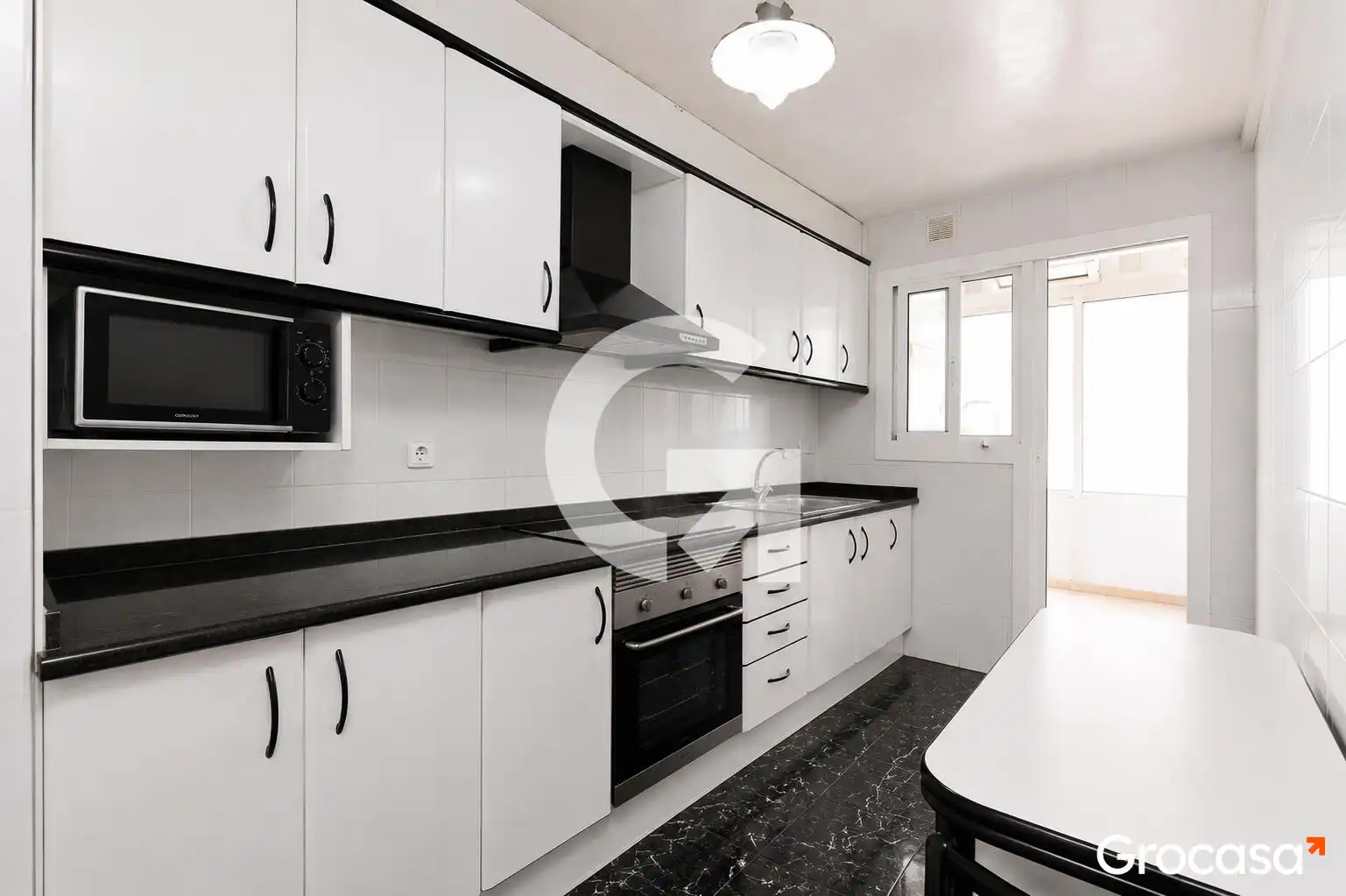 Kitchen of Flat for sale in El Prat de Llobregat  with Air Conditioner, Oven and Balcony