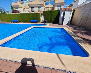 Piscina de Casa adosada en venda en Pilar de la Horadada amb Aire condicionat, Terrassa i Balcó