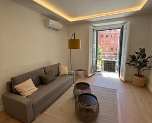 Living room of Apartment for sale in  Madrid Capital  with Air Conditioner, Terrace and Balcony