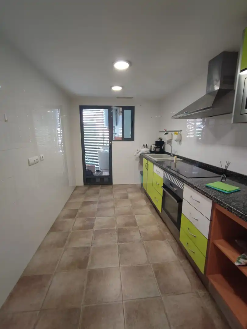 Kitchen of Flat for sale in Sueca  with Air Conditioner and Storage room