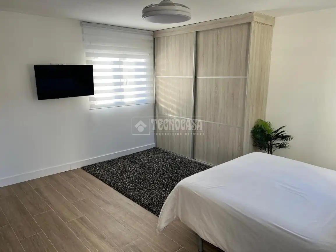 Schlafzimmer von Wohnung zum Verkauf in Rincón de la Victoria mit Klimaanlage, Abstellraum und Gemeinschaftspool