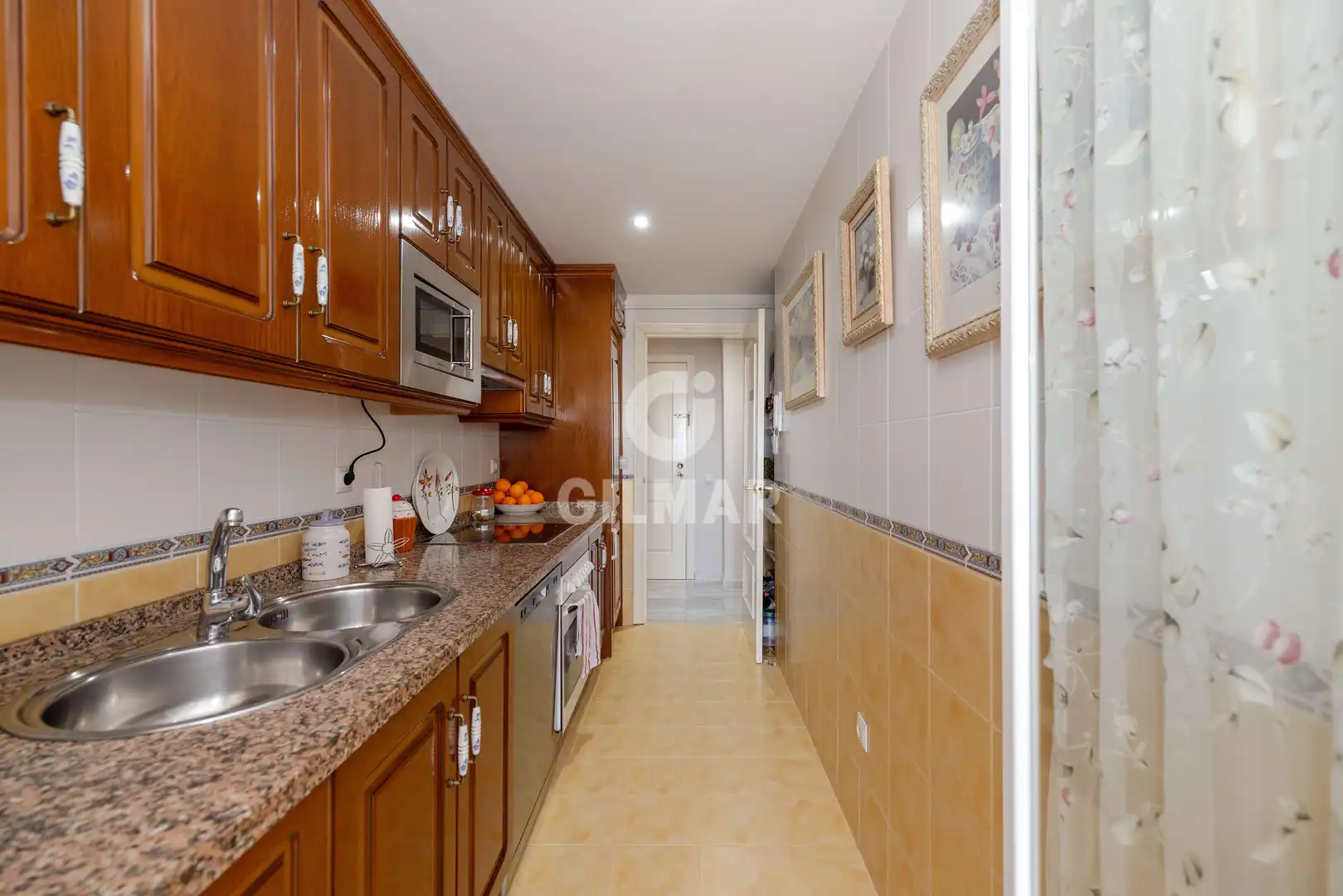 Küche von Wohnung zum Verkauf in Benalmádena mit Privatgarten, Schwimmbad und Möbliert