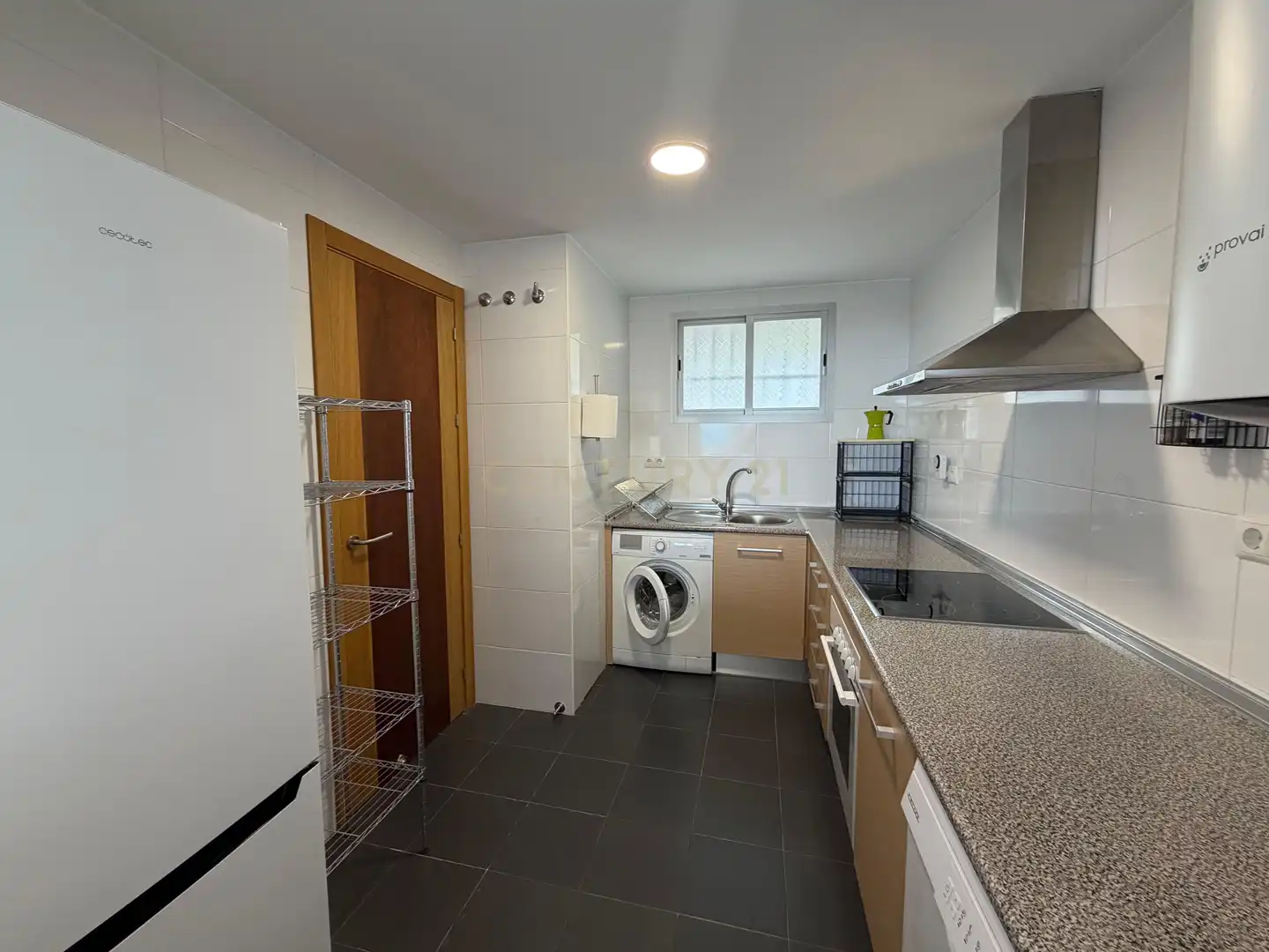 Cuina de Apartament de lloguer en Mijas amb Aire condicionat, Jardí privat i Traster