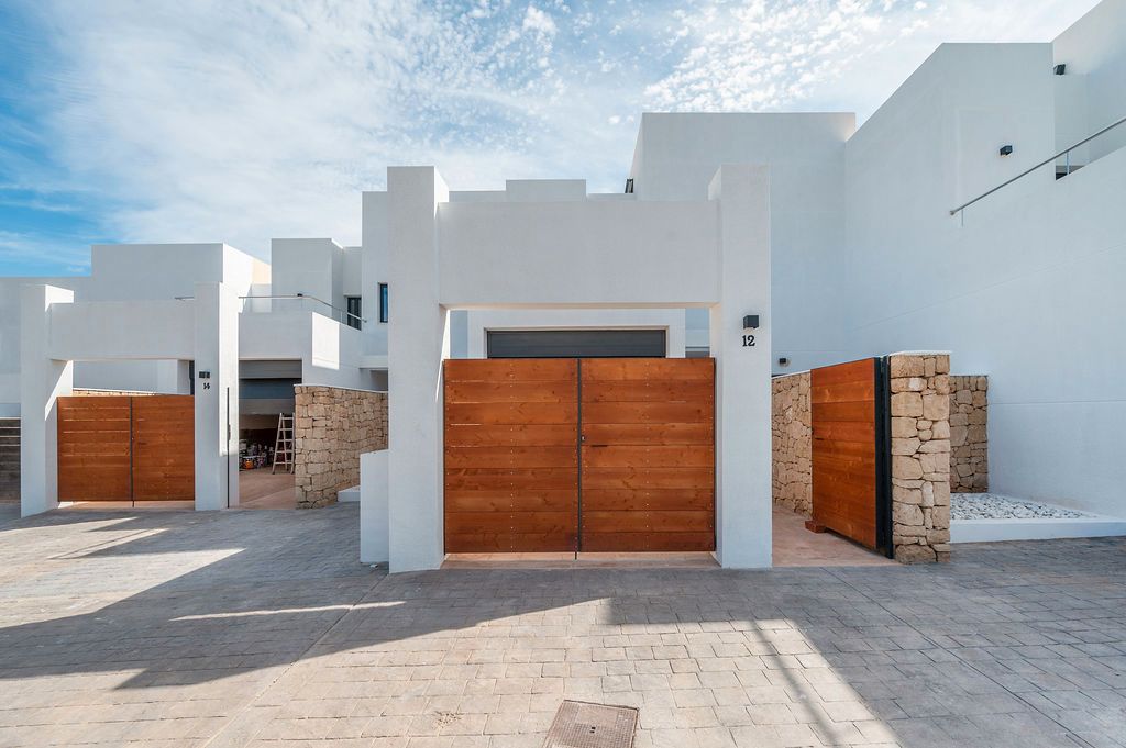 Vista exterior de Casa adosada en venta en Sant Josep de sa Talaia con Piscina comunitaria
