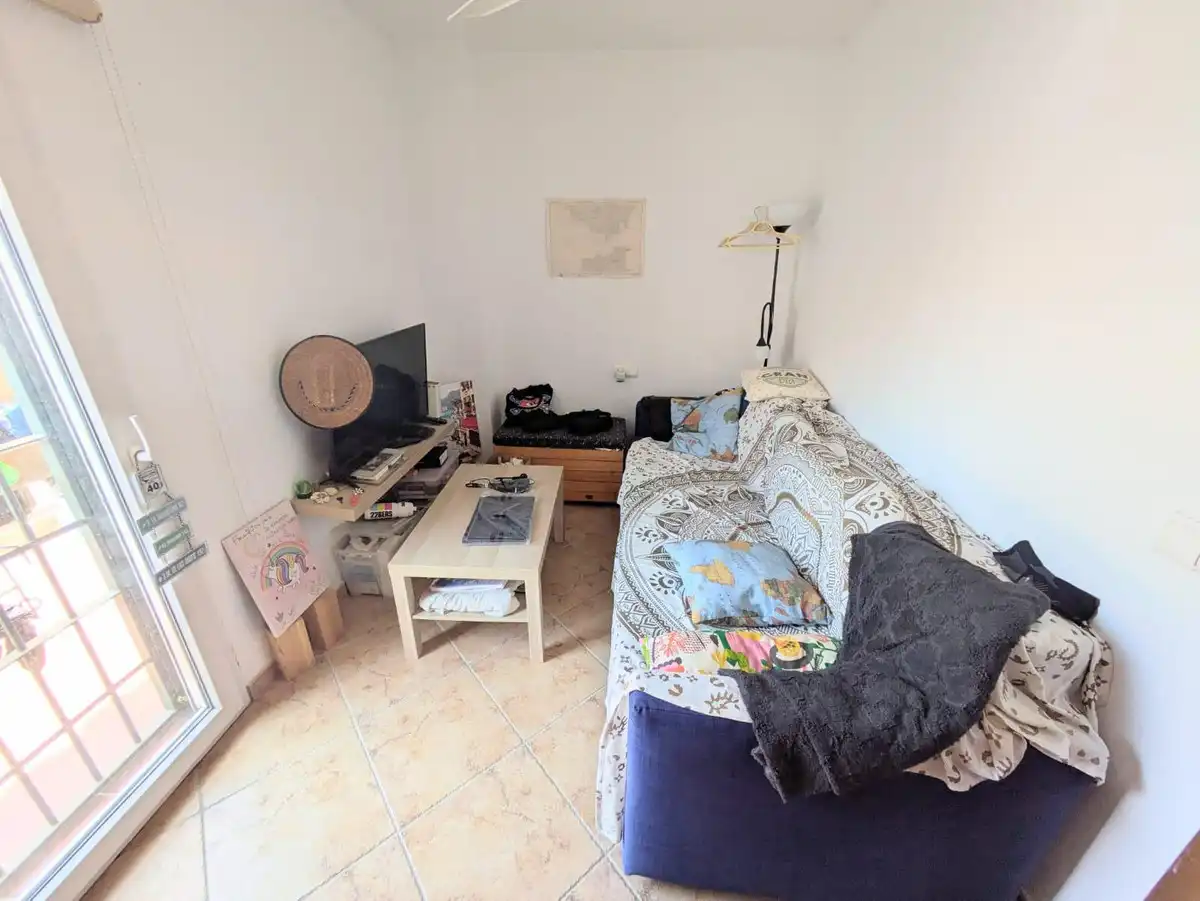 Sala d'estar de Casa adosada en venda en Torremolinos amb Aire condicionat, Calefacció i Jardí privat