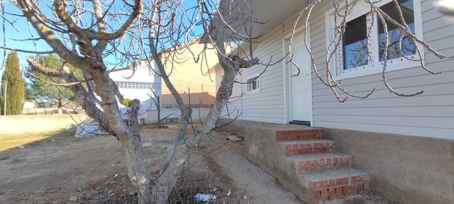 Vista exterior de Casa o xalet en venda en Mejorada del Campo amb Calefacció, Jardí privat i Parquet