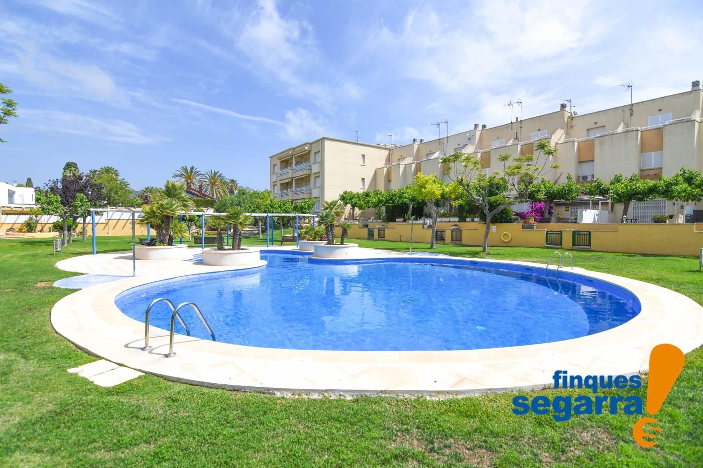 Swimming pool of Single-family semi-detached for sale in Roda de Berà  with Heating, Private garden and Terrace