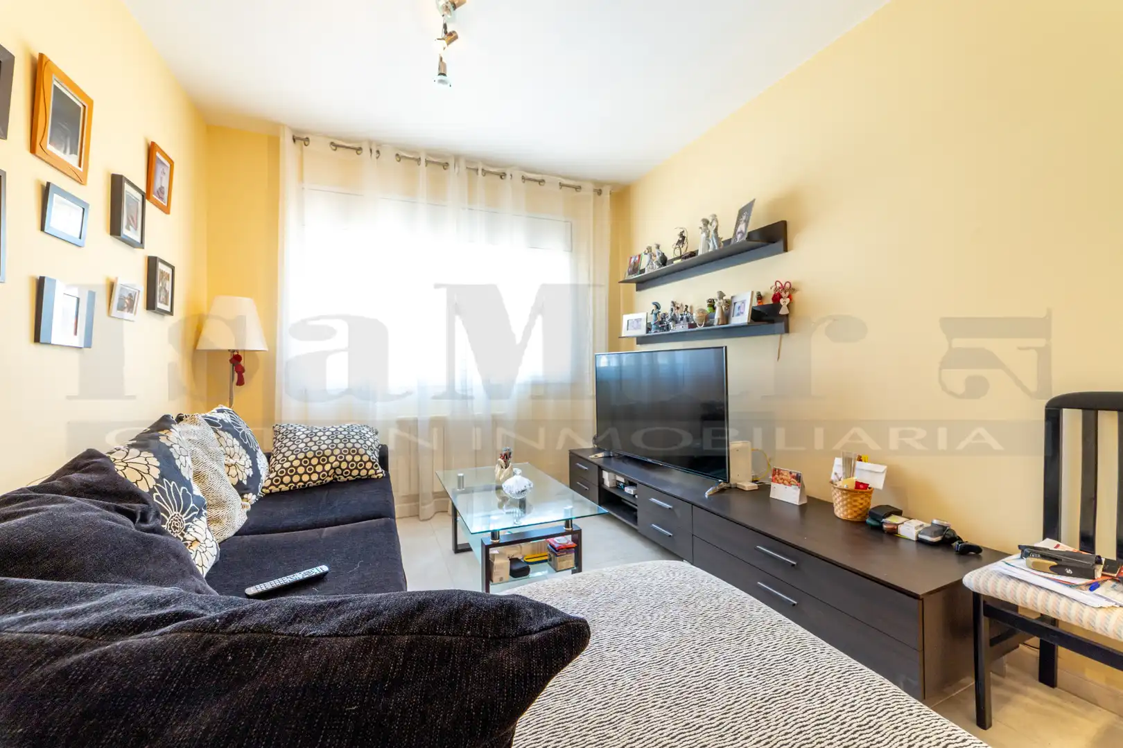 Sala de estar de Casa adosada en venta en Calafell con Aire acondicionado, Calefacción y Jardín privado