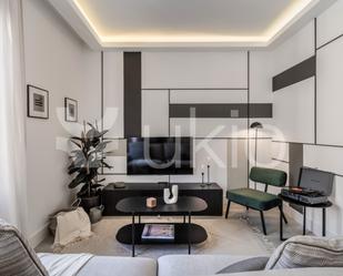 Sala d'estar de Apartament de lloguer en  Madrid Capital amb Aire condicionat, Calefacció i Moblat