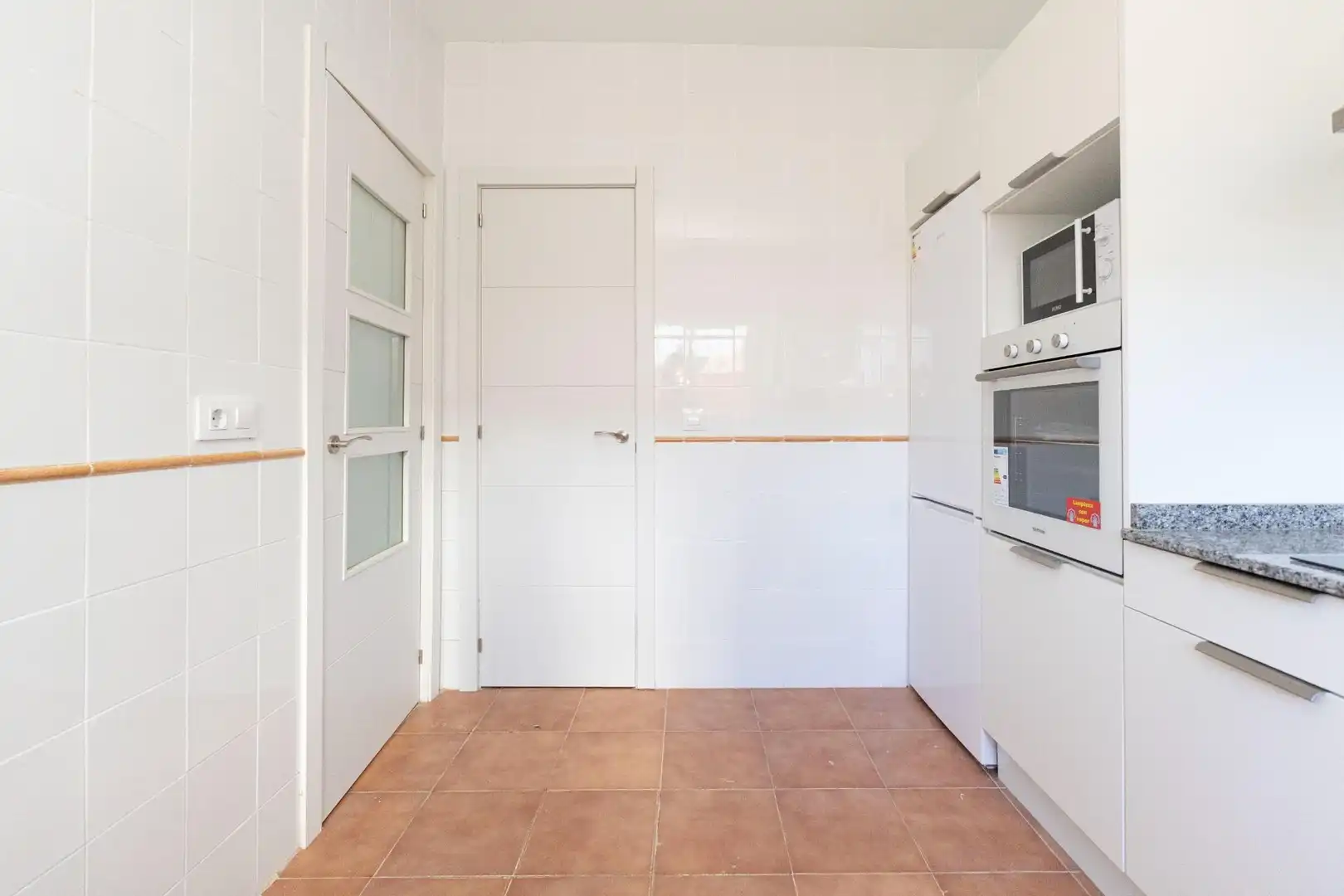 Cuina de Casa adosada en venda en La Palma del Condado amb Terrassa