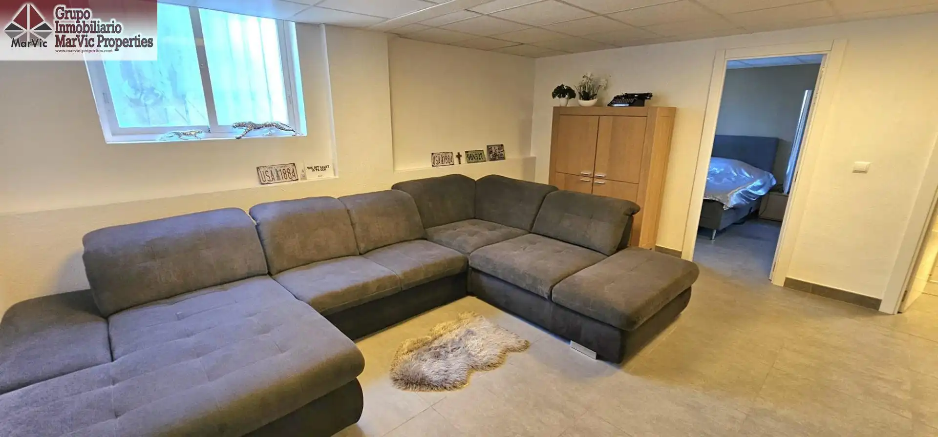 Sala d'estar de Casa o xalet en venda en La Nucia amb Aire condicionat, Jardí privat i Terrassa