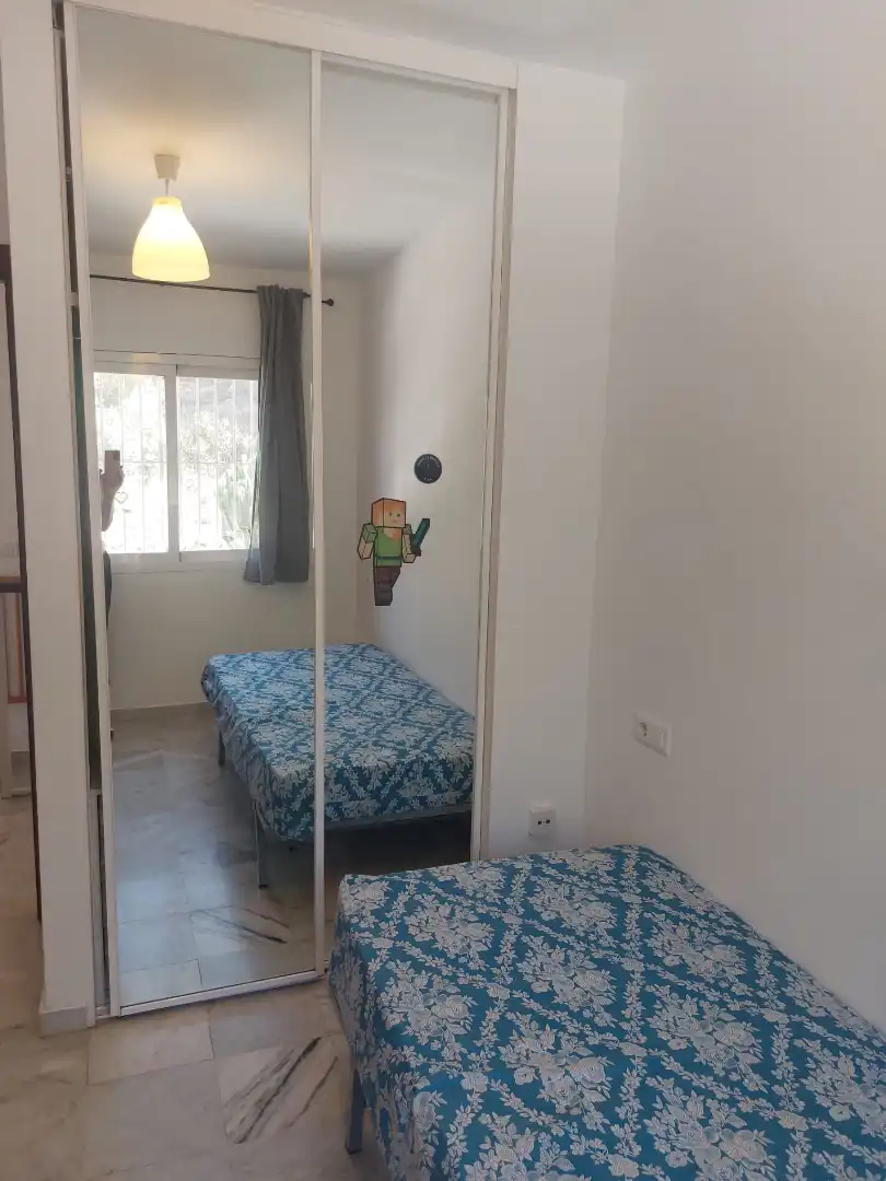 Habitación de Casa adosada de alquiler en Benalmádena con Aire acondicionado, Terraza y Amueblado