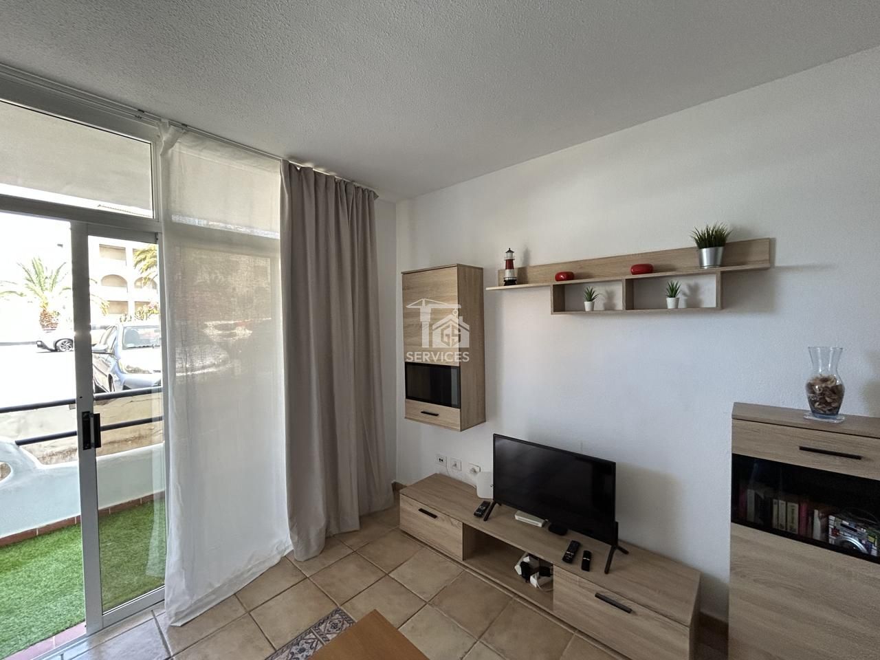 Sala d'estar de Planta baixa en venda en Adeje amb Aire condicionat, Terrassa i Moblat