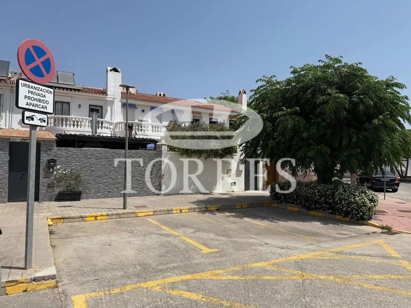 Parking de Casa adosada en venta en Málaga con Terraza, Balcón y Piscina comunitaria