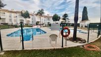 Swimming pool of Single-family semi-detached for sale in Vélez-Málaga  with Air Conditioner, Heating and Community pool