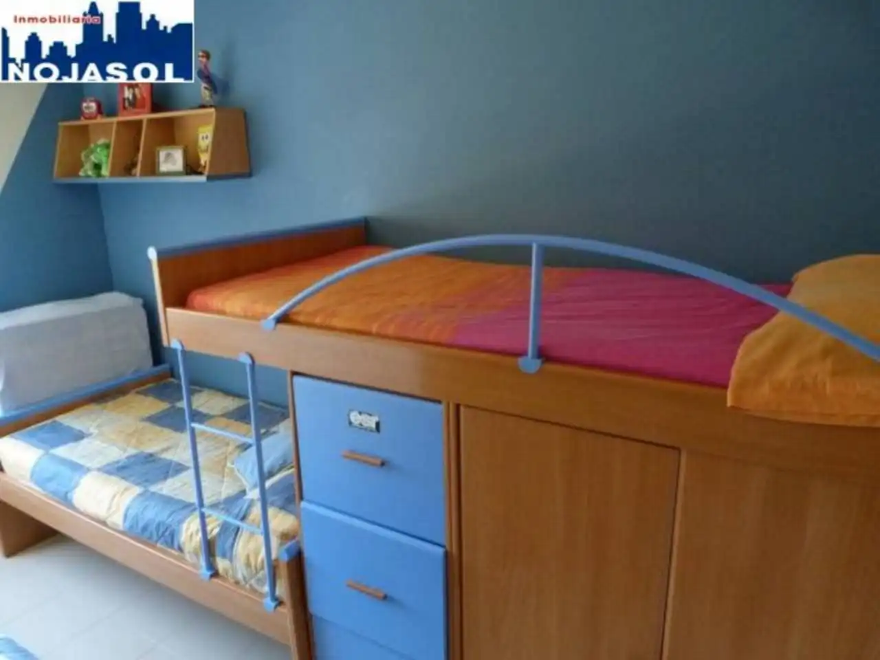 Dormitori de Apartament de lloguer en Arnuero amb Calefacció, Jardí privat i Terrassa