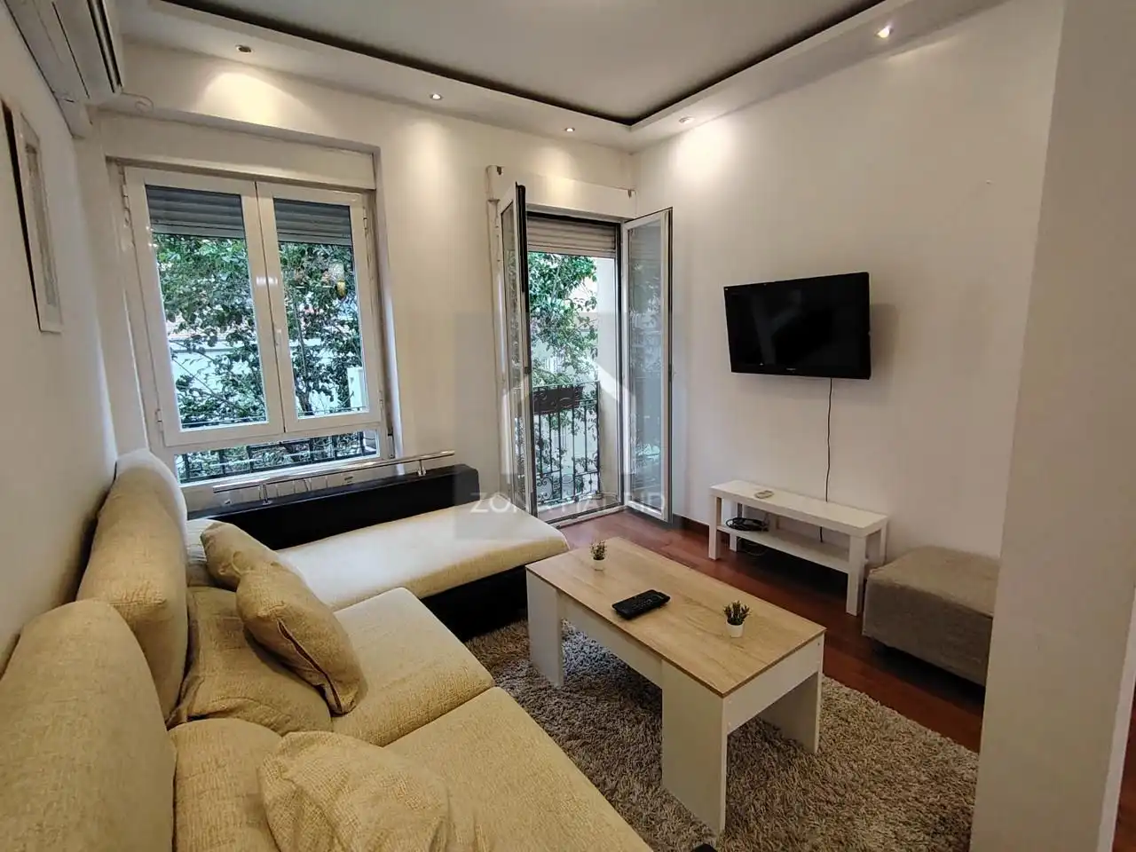 Sala de estar de Piso en venta en  Madrid Capital con Aire acondicionado y Balcón