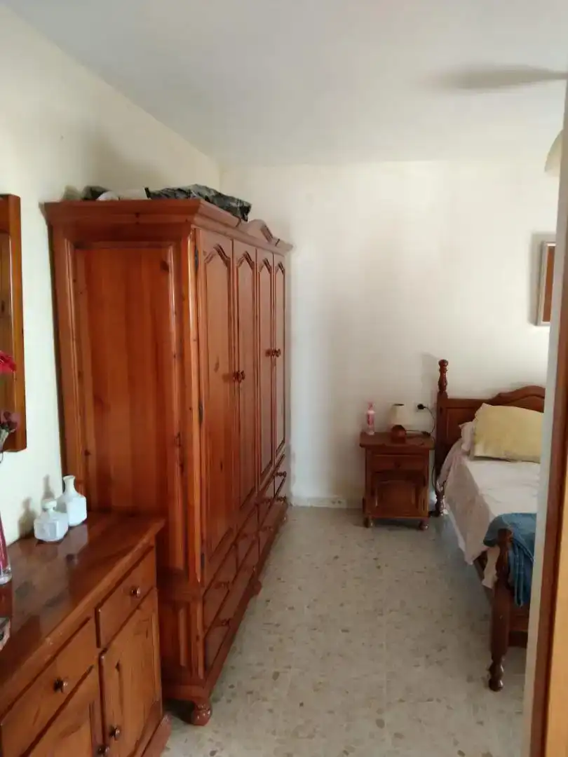 Dormitori de Casa adosada en venda en Vélez-Málaga amb Aire condicionat i Balcó