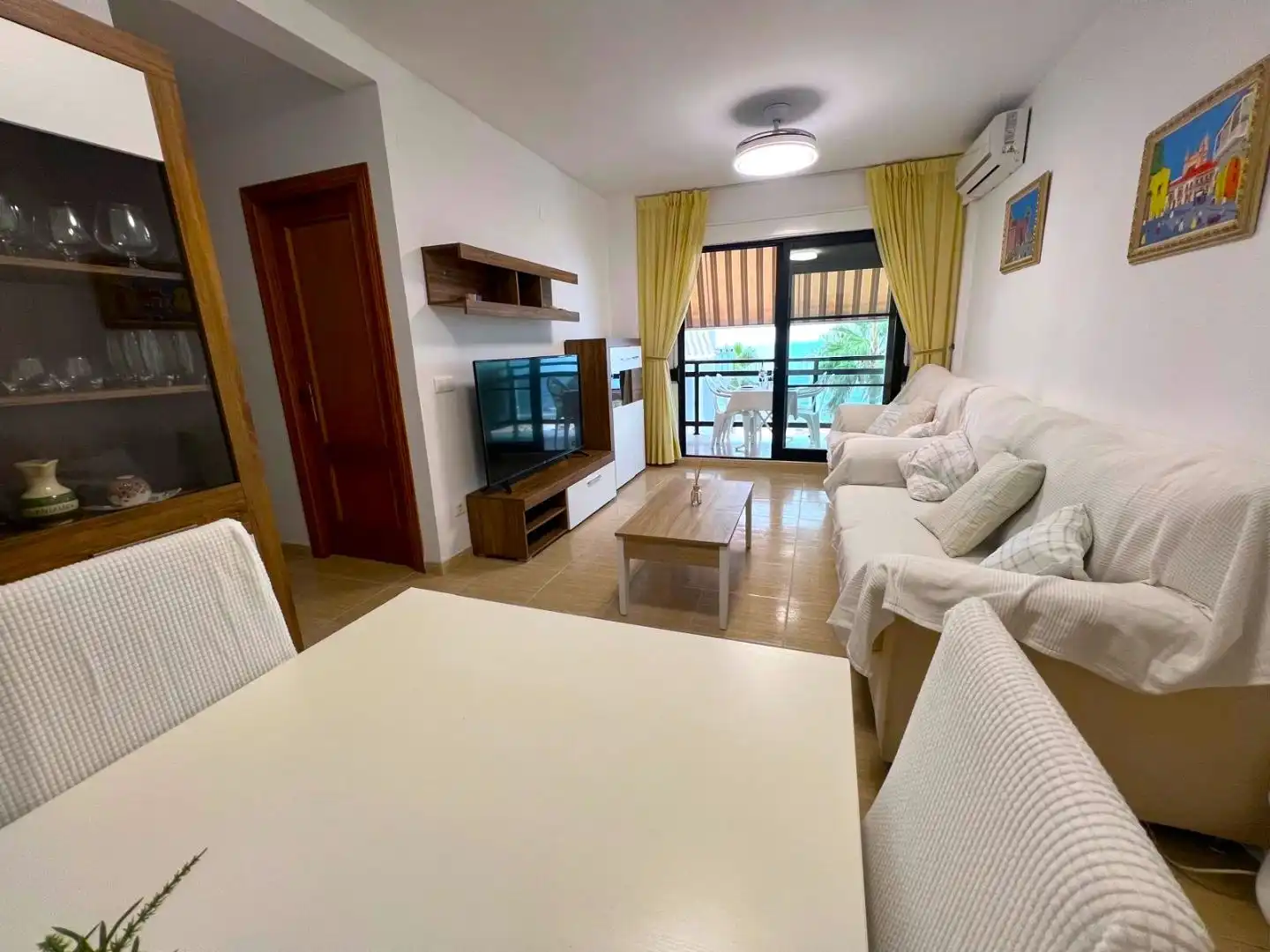 Sala d'estar de Pis de lloguer en Daimús amb Aire condicionat, Jardí privat i Terrassa