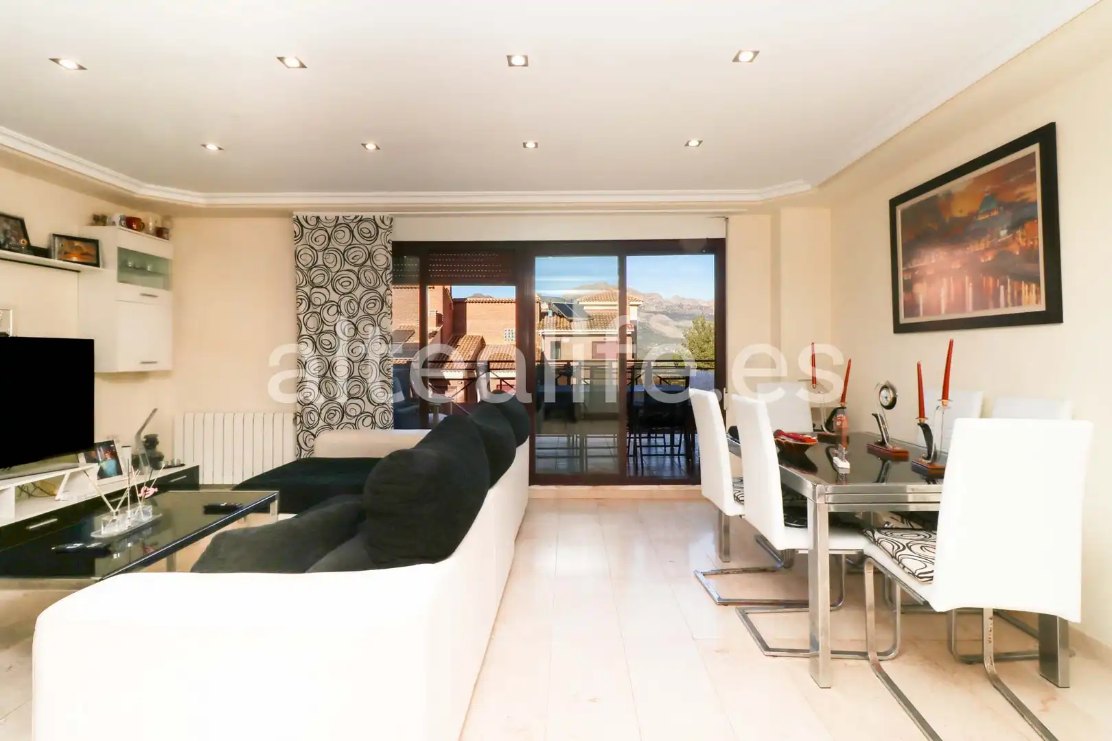 Sala de estar de Casa adosada en venta en La Nucia con Calefacción, Terraza y Piscina comunitaria