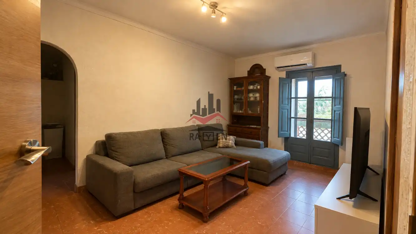 Sala d'estar de Casa adosada en venda en Riumors