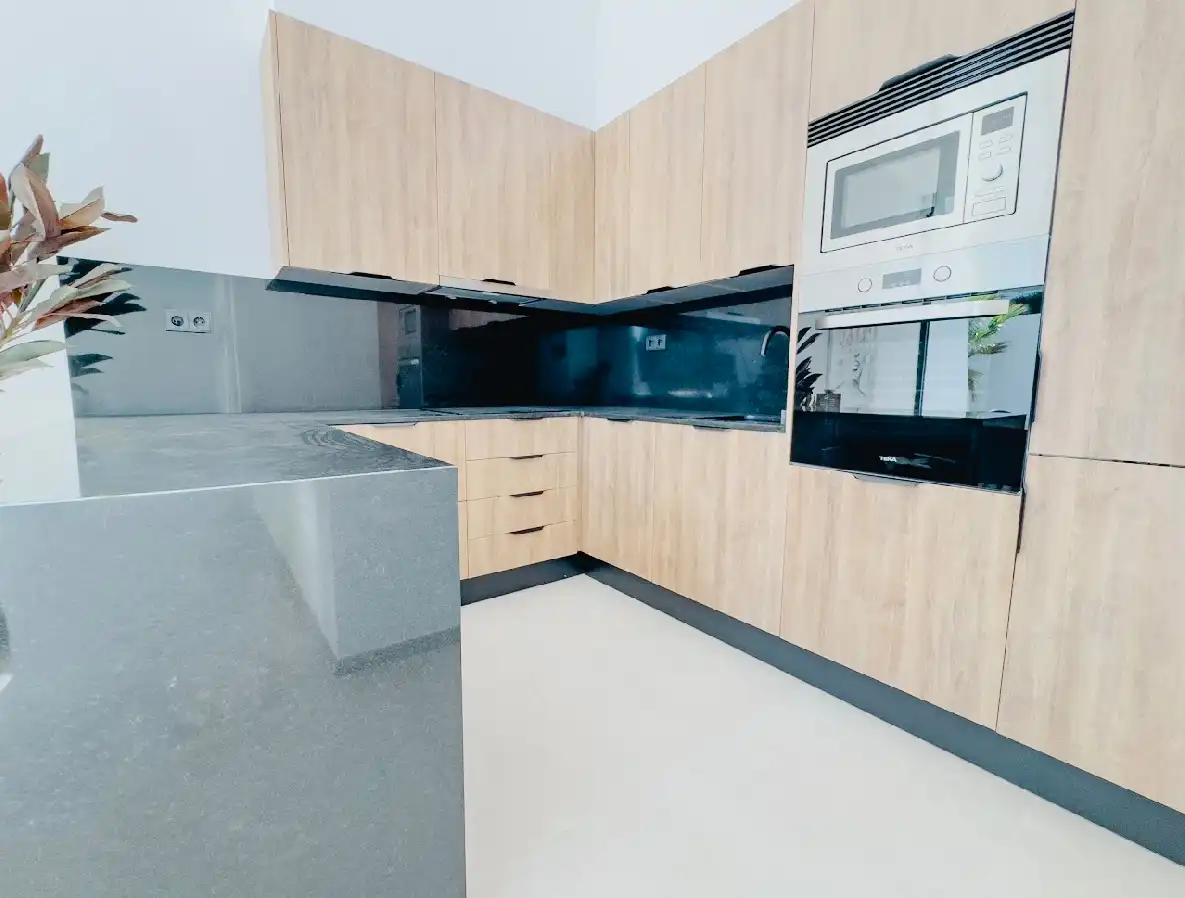 Cuina de Casa adosada en venda en Calpe / Calp amb Aire condicionat, Calefacció i Jardí privat